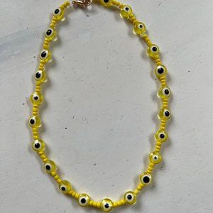 Yellow evil eye necklace